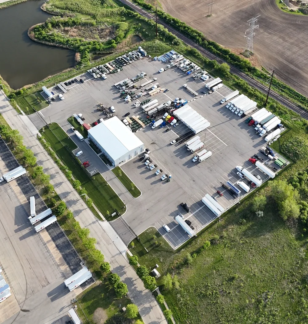 Aerial view of the fenced perimeter and entrance gate at RT Group's Zion, IL truck parking yard