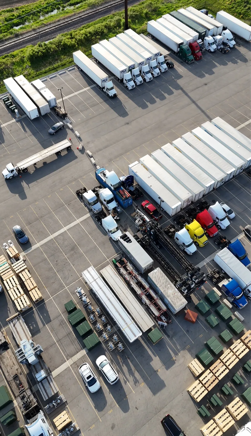 Full aerial overview of RT Group's paved and fenced truck parking yard in Zion, IL